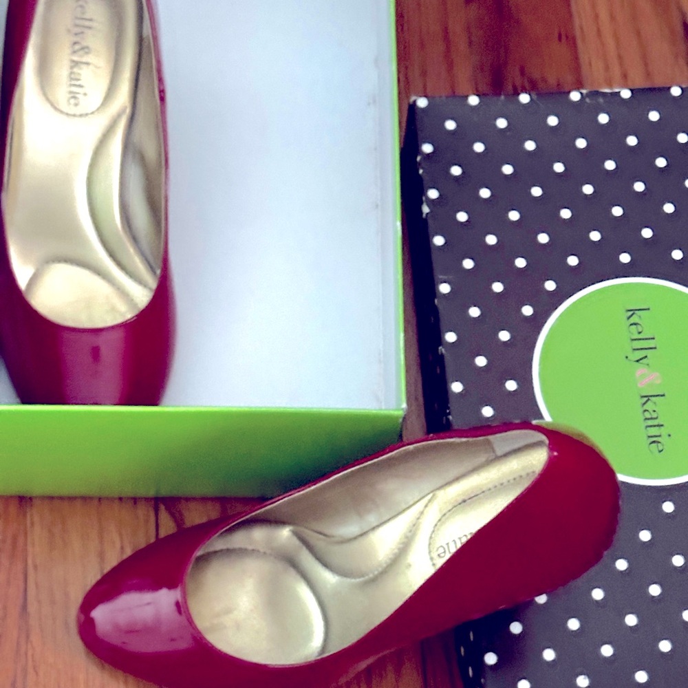 Comfortable red patent leather heels. Heel height measurement is 3 inches.